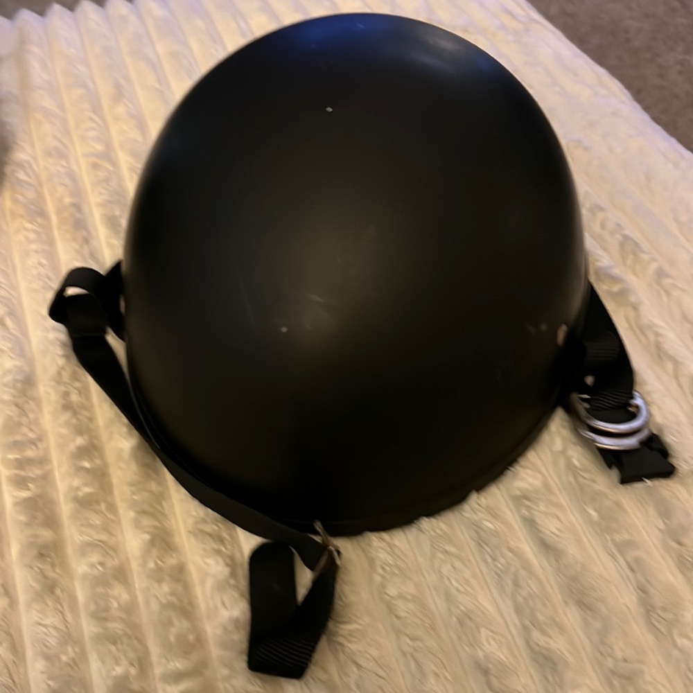 Open Road Helmet features padded straps for comfort and a matte finish